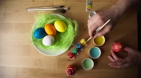 Female Hand Painted Easter Eggs with a Brush Stock Footage 61743549