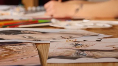 Female hand painting with colored pencils Stock Footage