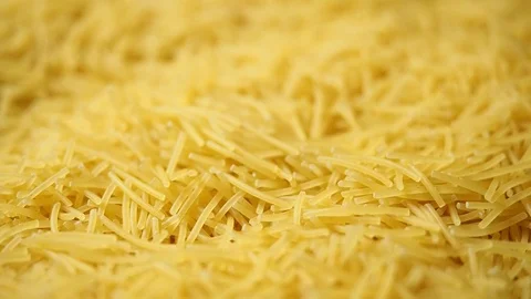 Female hand picks dry thin short noodles for cooking Stock Footage 110791184