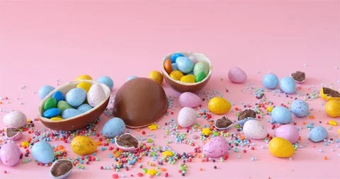 Female Hand Places Easter junk-food, confectionery Stock Footage 126608396