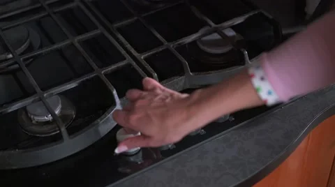 Female hand placing espresso maker on stove Video stock 65461644