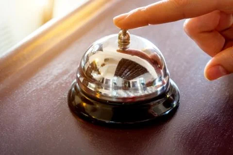 Female hand presses the button Stock Photos