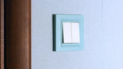 Female hand presses button of switch close up. Hand with finger on light switch Stock Footage 122297431