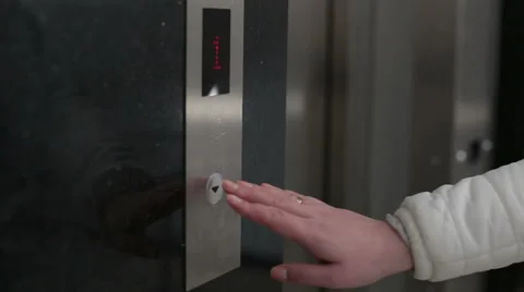 The female hand presses the elevator button Stock Footage 61847647