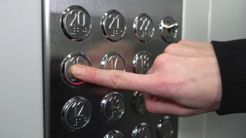 A female hand presses the elevator button. Stock Footage 147346122