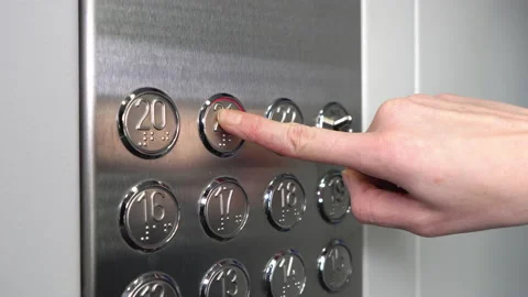 A female hand presses the elevator button. Stock Footage 147346526