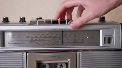 Female Hand Presses Play Button on Retro Tape Recorder with Cassette. 4K Stock Footage 148747515