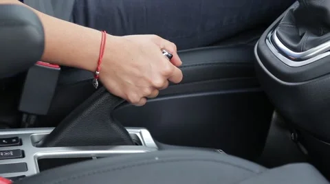 Female hand pulling а handbrake Stock Footage 52208013