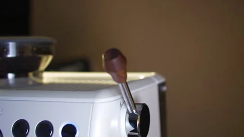 Female Hand Pulling Steam Lever on Espresso Machine Видео 329095144