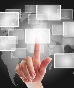 Female hand pushing a button on a touch screen interface over world map fe... Stock Photos