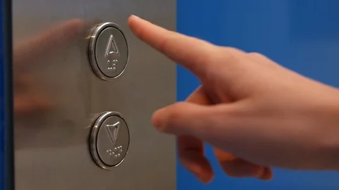 Female Hand Pushing Elevator Button in Office Center or Hotel. Young Woman Stock Footage 113043481