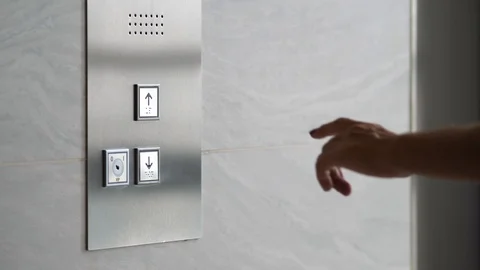 Female Hand Pushing Elevator Button in Office Center or Hotel. Young Woman Stock Footage 118290705