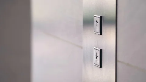Female Hand Pushing Elevator Button in Office Center or Hotel. Young Woman Stock Footage 119019890