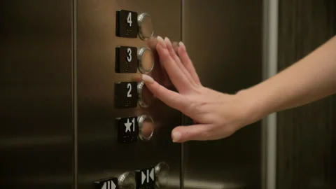Female Hand Pushing Elevator Button in Hotel Stock Footage 286078800
