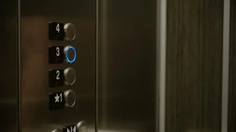 Female Hand Pushing Elevator Button in Hotel or Office Building. Close up view Stock Footage 287017009