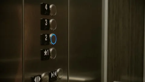 Female Hand Pushing Elevator Button in Hotel or Office Building. Close up shot Stock Footage 287270199