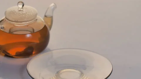 The female hand put down the cup of tea in slow-motion Stock Footage 138262694