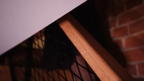 Female hand with red nails sliding down the staircase railing close up. Stock Footage 123760979