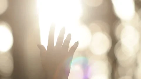 Female hand with a ring in sunlight reflections Stock Footage 85825503