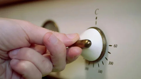 A Female Hand Sets the Time, Mode, Cooking Temperature on a Modern Oven, Stove Stock-Footage 166939873