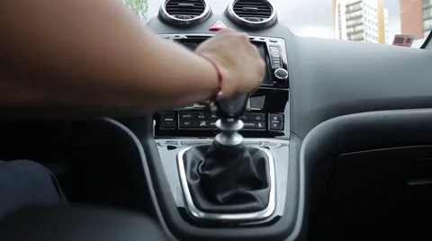 Female hand shifting gears of a car Stock Footage