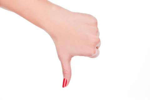 Female hand showing thumbs down symbol. Fail. Female hand with red fingern... Stock Photos