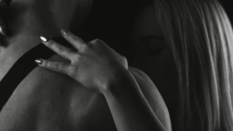 Female hand slowly touching back of young muscular man Video stock 86993267