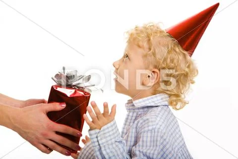 Female hand stretching gift to boy Stock Photos