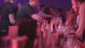 Female hand takes champagne glass from bar at night club party HD Footage