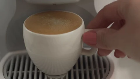 Female hand taking cup of espresso from capsule coffee machine Stock Footage 111585185
