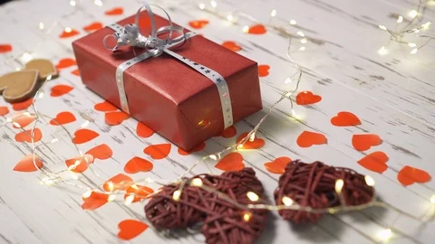 Female hand taking a gift box from the desk, close up. Stock Footage 122335997