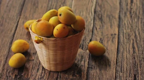 Female hand taking one mango 스톡 동영상 63611876