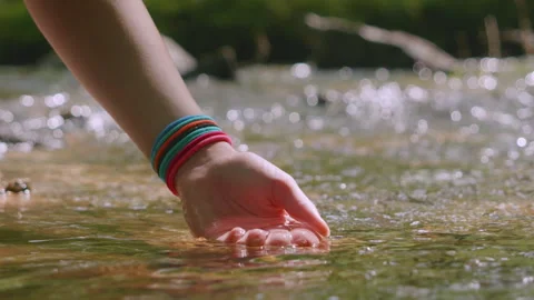 Female Hand Touching River Flow. Hands With Pure Spring Water. Crystal Clea.. Stock Footage 330805571