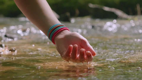 Female Hand Touching River Flow. Hands With Pure Spring Water. Crystal Clea.. Video stock 331957902