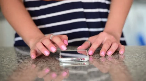 Female hand touching screen on modern mobile smart phone. Close-up footage wi Stock Footage 68534467