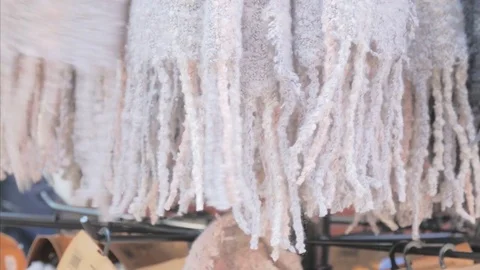 Female hand touching Soft and light fabric with stripes and fringes Video stock 80716756