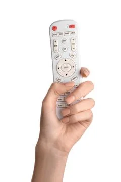 Female hand with TV remote controller on white background 库存照片