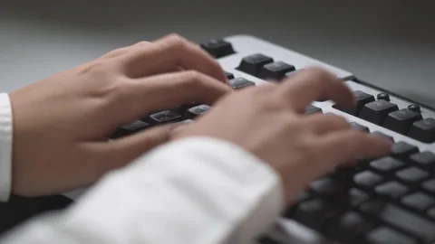 Female hand using computer keyboard &amp; mouse Stock Footage 277200173