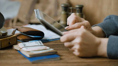 Female hand using digital tablet. Concept of travel. Stock Footage 94897322