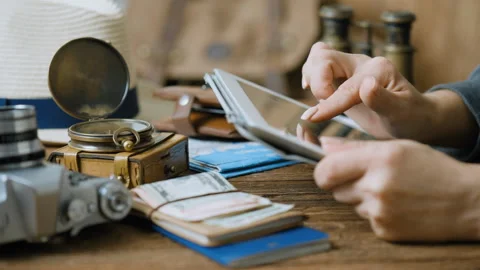 Female hand using digital tablet.  Concept of travel. Stock Footage 94897399