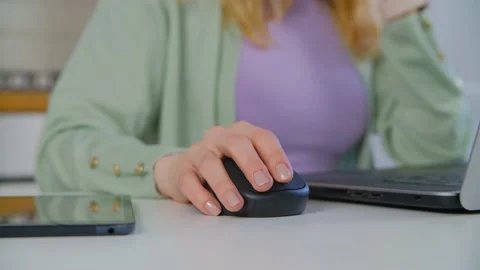 Female hand using modern computer mouse for work in 4k video clip Stock Footage 212578821