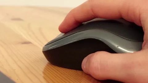 Female hand using wireless computer mouse close up Stock Footage 255982816