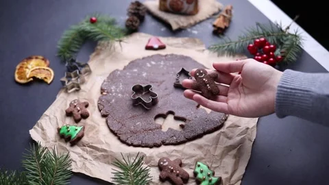 Female hand while holding fine decorated ginger cookie. Stock Footage 167427878