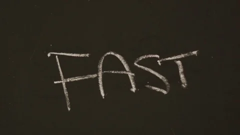 Female hand writes fast on a blackboard Stock Footage 80280631