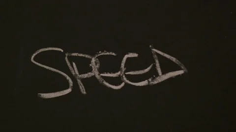 Female hand writes speed on a blacboard Stock Footage 80280838