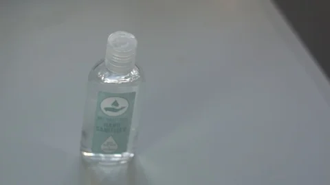 Female hands applying hand sanitiser (log) 3 Stock Footage 126986763