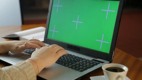 Female hands are typing on a computer keyboard in an office Vidéo 122589548