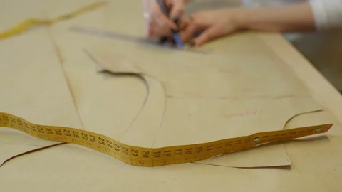 Female hands on the background of a sewing machine 動画素材 74276697