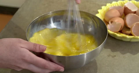 Female hands beating eggs, baking, close up Stock Footage 58768378