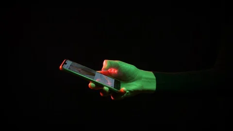 Female hands on a black background Stock Footage 127794550